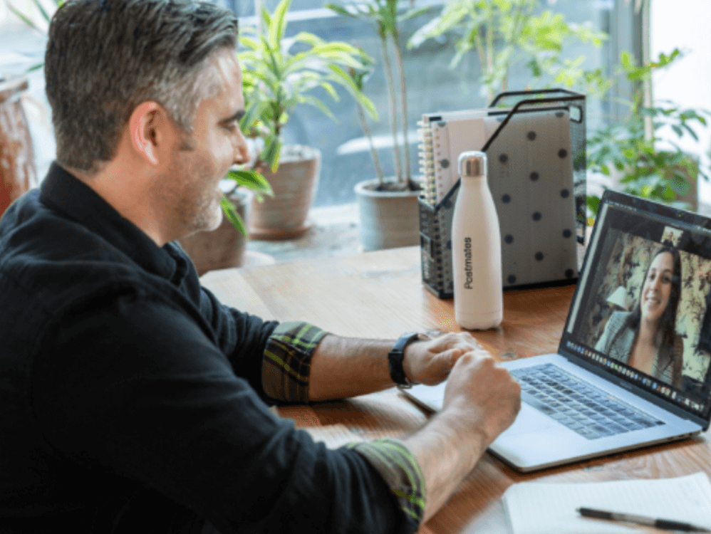 man and woman on videoconference