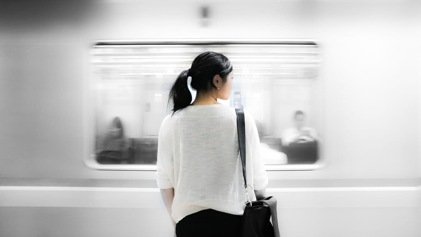 Woman waiting for train