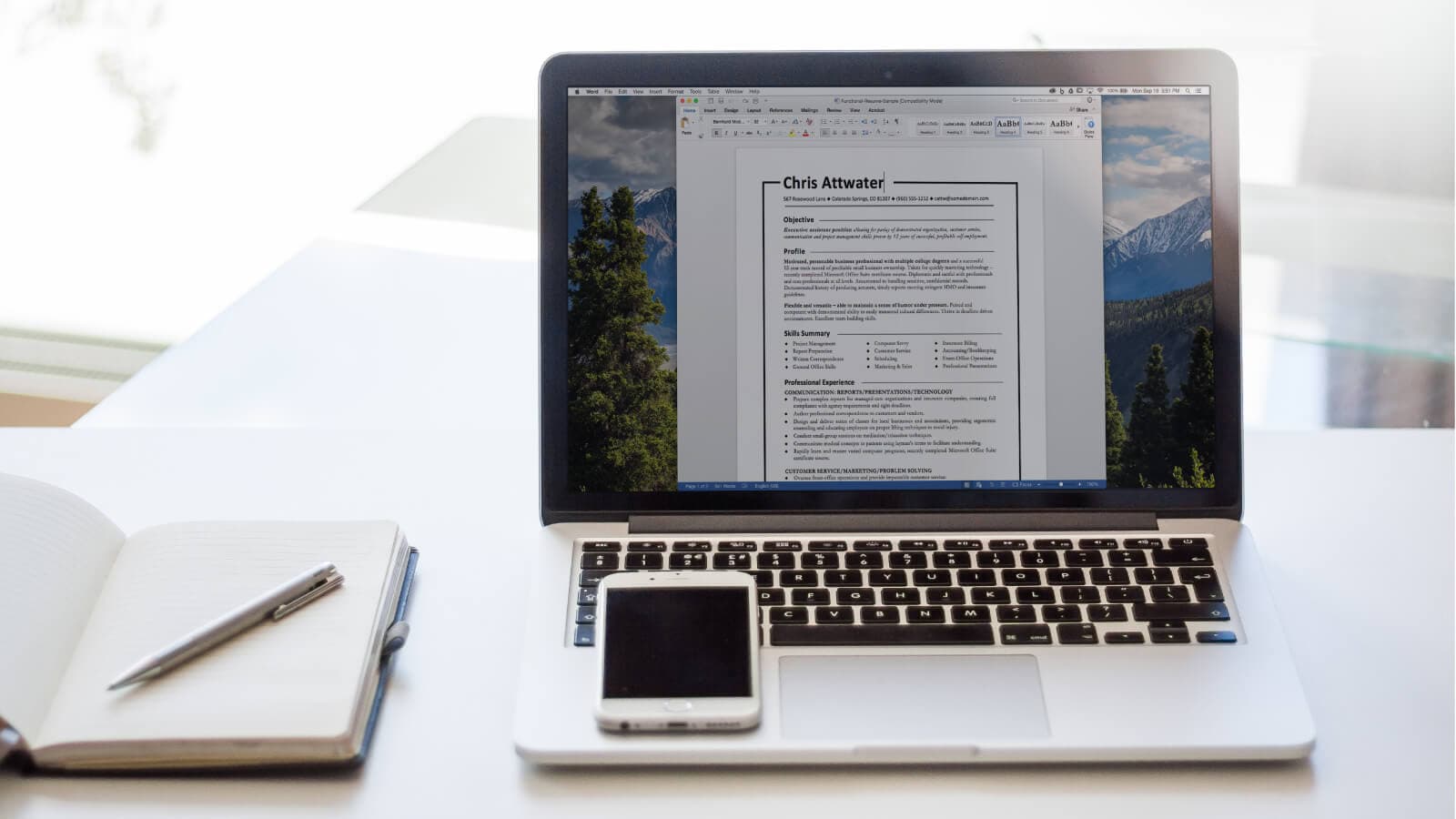 Laptop with an image of a resume