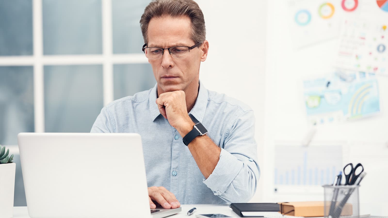 man working on his laptop