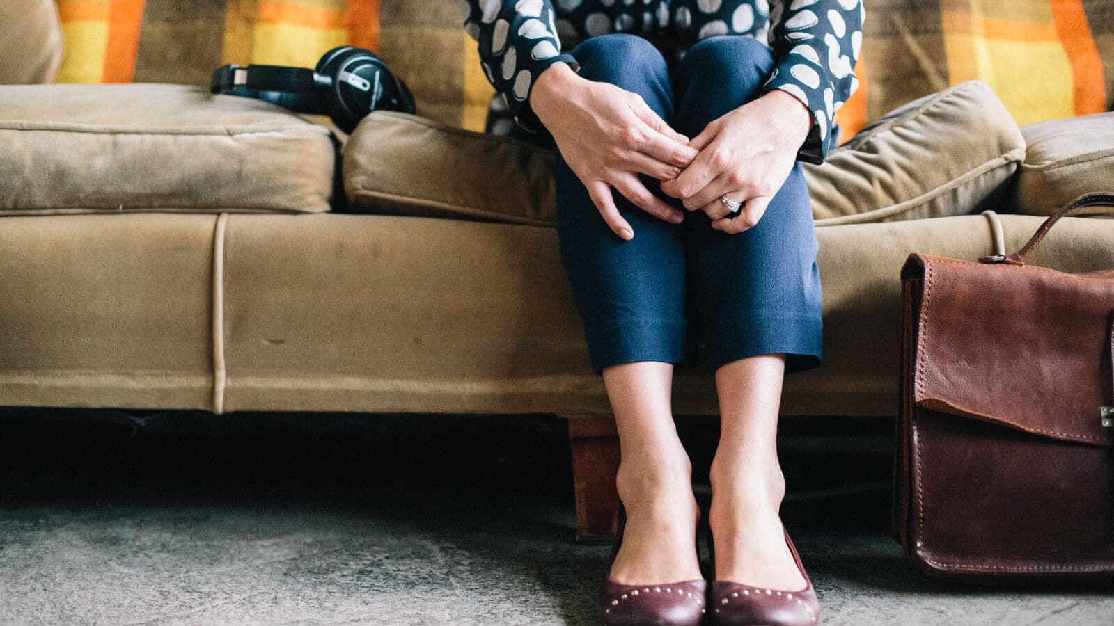 Woman sitting on couch