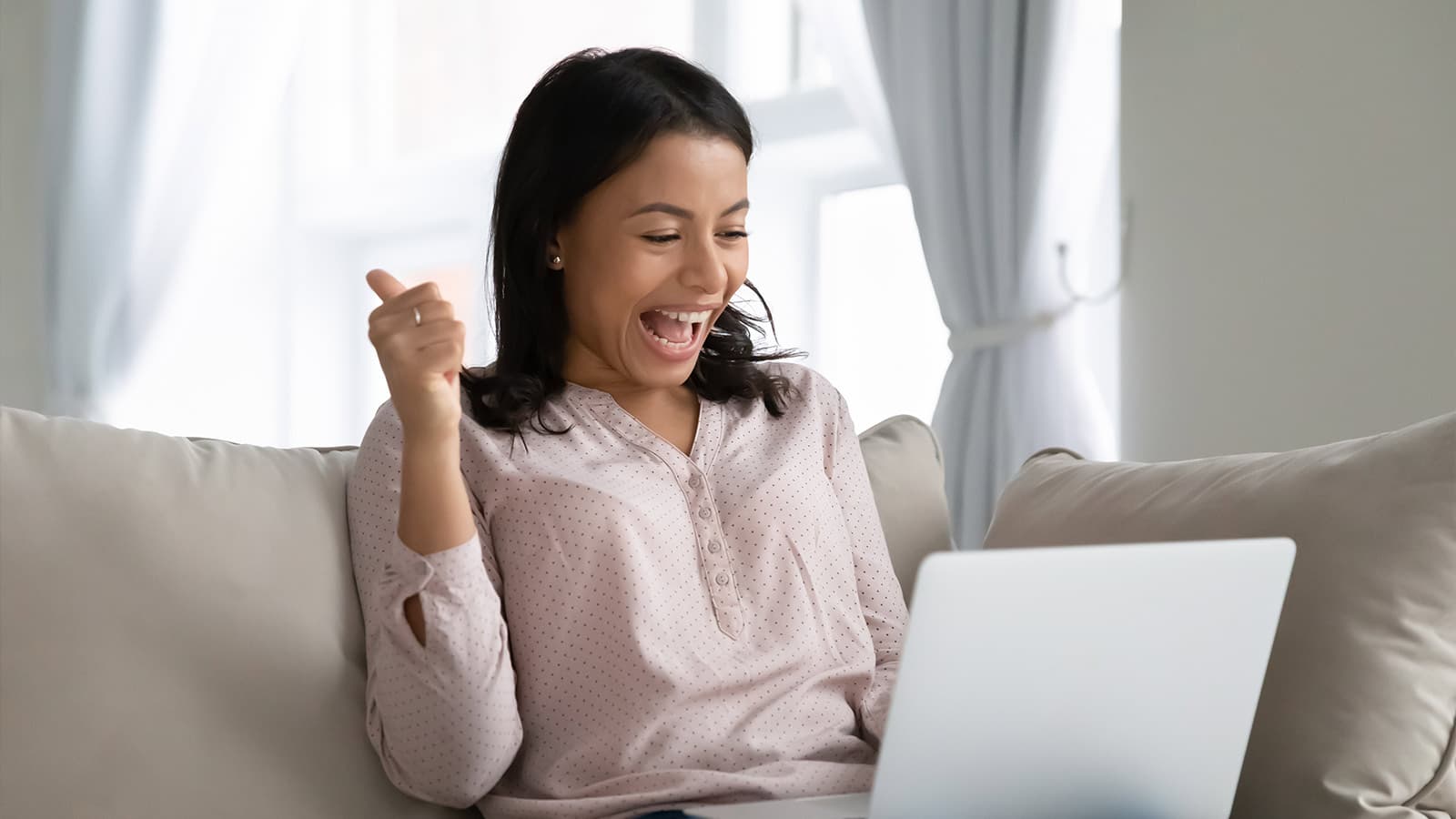 Woman in pink with Thumbs Up