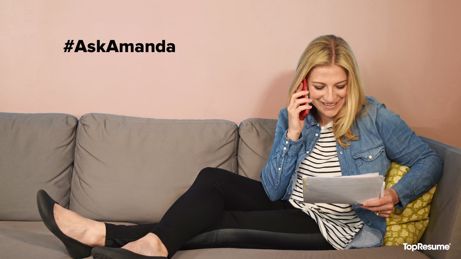 woman on couch talking on phone