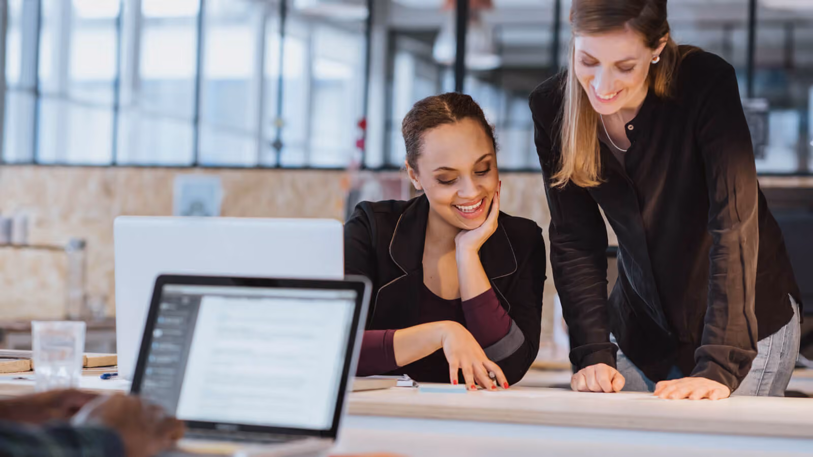 Two women at work